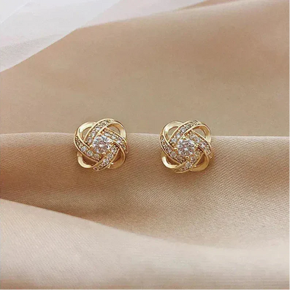 Pendientes Dorados Espiral Floral con Cristales